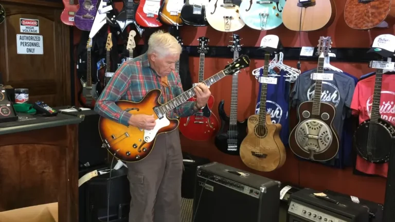 An 81-year-old grandpa walks into a guitar store, picks up one of the guitars, and starts playing to everyone’s amazement.