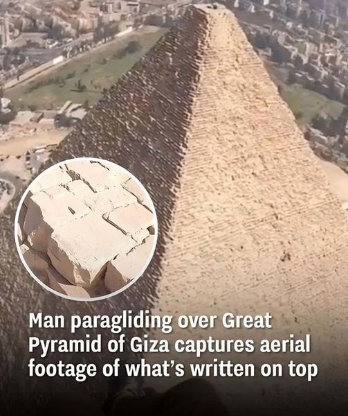 Man paragliding over the Great Pyramid of Giza captures aerial footage of what’s written on top